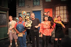 AUSTIN BAUMAN In its staging of the satirical 2003 musical "Avenue Q," Maverick Theater features, from left, Curtis Andersen as Brian, Adair Gilliam as Gary Coleman, Tyler McGraw as Princeton, Bachi Dillague as Christmas Eve, Rachel McLaughlan as Kate Monster and, behind them, Kevin Garcia as Nicky and Michael Rodriguez as Rod.